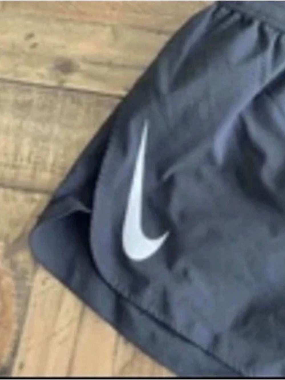 Nike Kids Black Shorts with White Swoosh